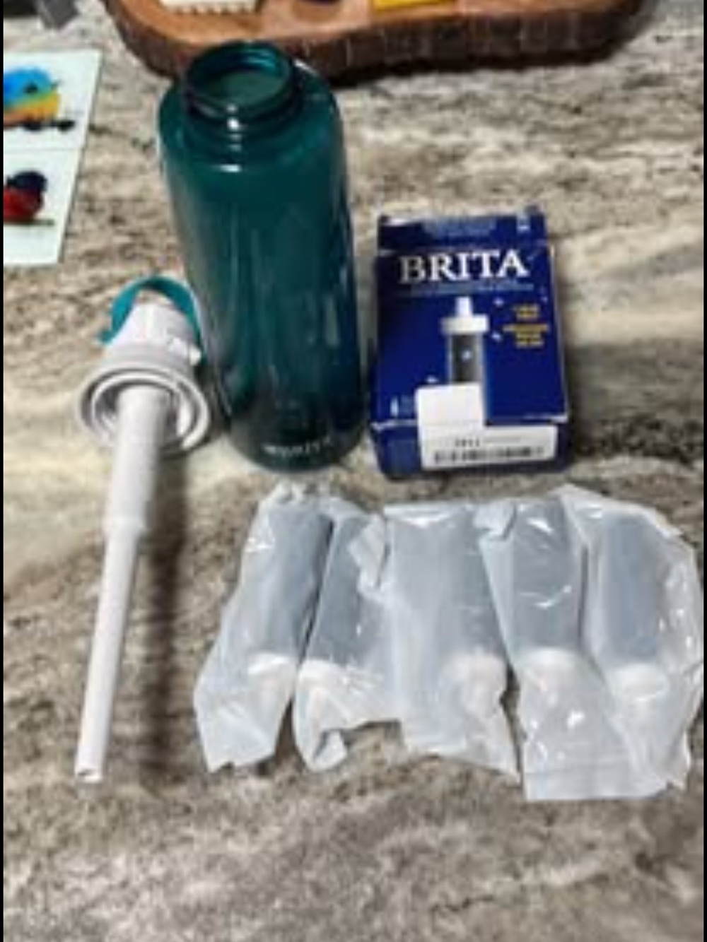 Brita Teal Water Bottle with White Filter Components